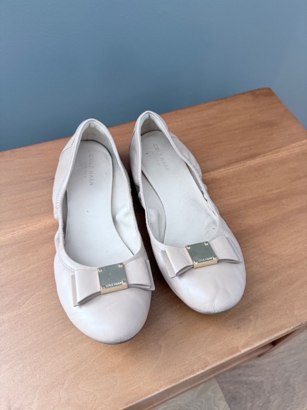 Cole Haan Women's Light Cream Bow Flats with Gold Accent